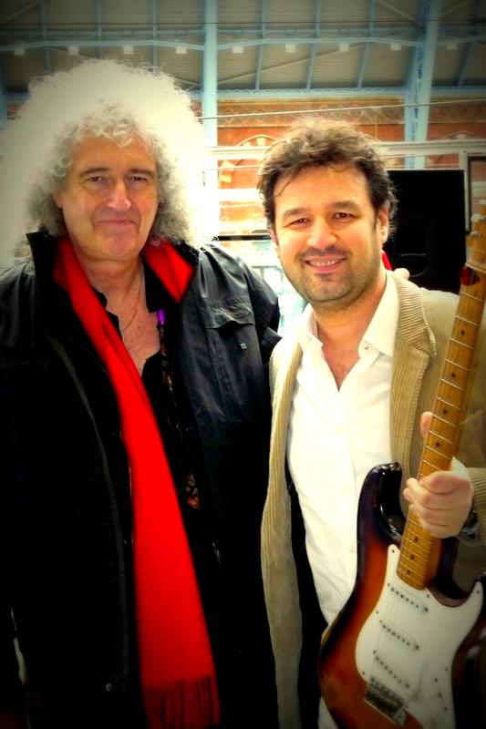 Jean-Pierre Danel & Brian May with Miss Daisy, the 1954 preproduction Fender Stratocaster